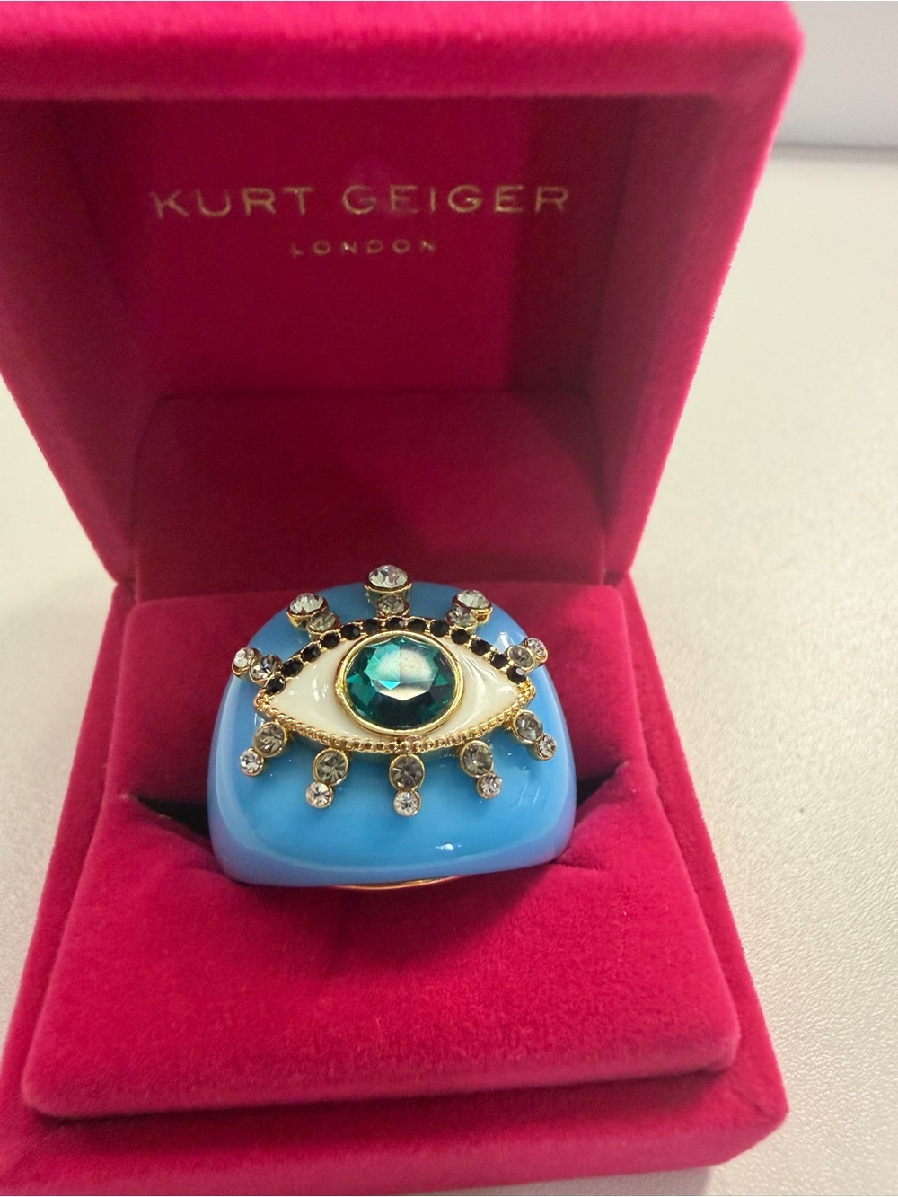 Kurt Geiger Blue Eye Statement Ring with Gold and Teal Accents